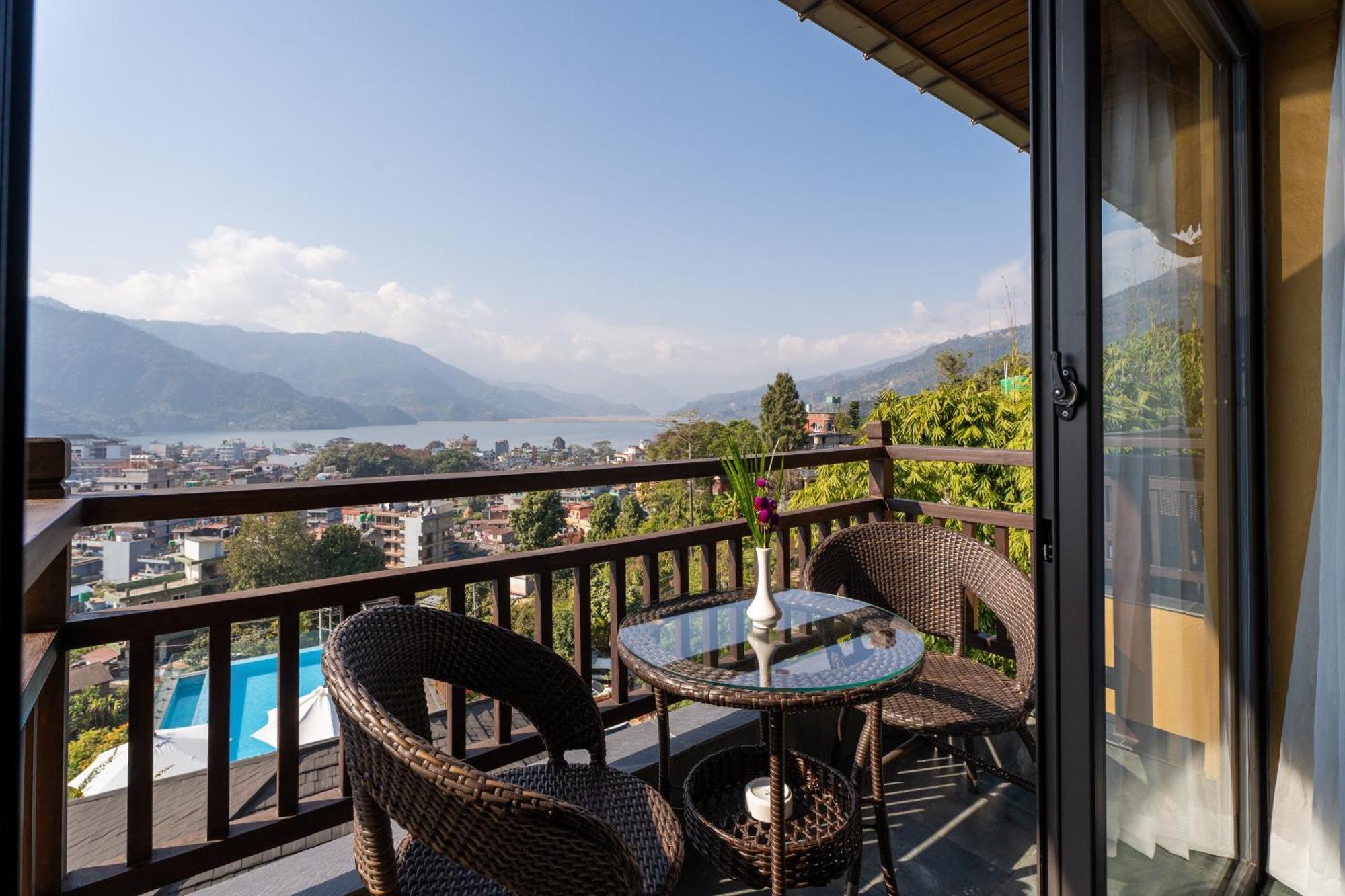 Bar Peepal Resort Pokhara Exterior foto A view of Lake Biwa from a guest room